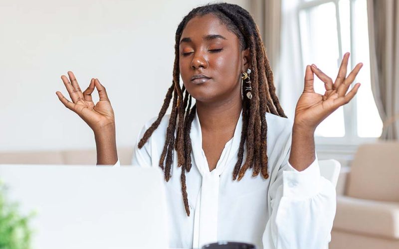 calm-african-female-executive-meditating-taking-break-work-mental-balance-mindful-businesswoman-feeling-relief-no-stress-doing-yoga-work-ignoring-avoiding-stressful-job2